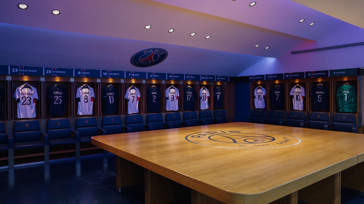 soccer team discussing strategy in locker room